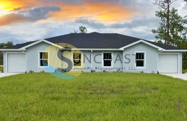 311 Norwalk Ave - 311 Norwalk Avenue, Lehigh Acres, FL 33972