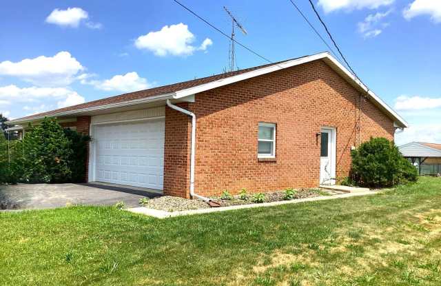 Spacious 3-Bed, 2.5-Bath Ranch-Style Home with Garage  Patio