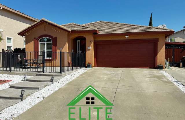 Photo of This Home offers a harmonious blend of comfort and functionality. Built in 2004, the residence boasts 1875sq ft thoughtfully designed living space on a lot.