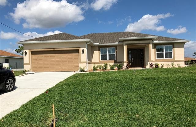 606 NW 27th TER - 606 Northwest 27th Terrace, Cape Coral, FL 33993