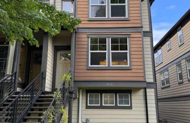 Amazing 2 Bed + Den, 2.5 Bath Townhome with A/C & 2-Car Garage in West Seattle!
