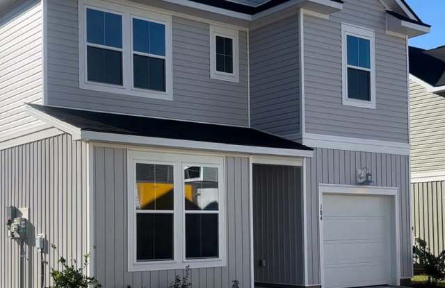 Photo of Brand New 4BR 3BA Home Close to the beach • Open-Plan Main Level • Patio in Little River!