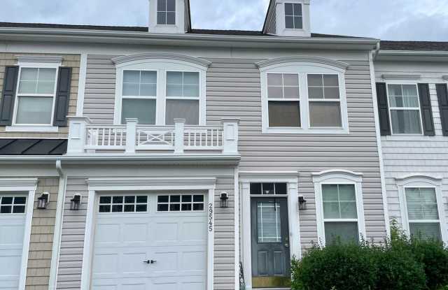 Modern and spacious town home with community pool.