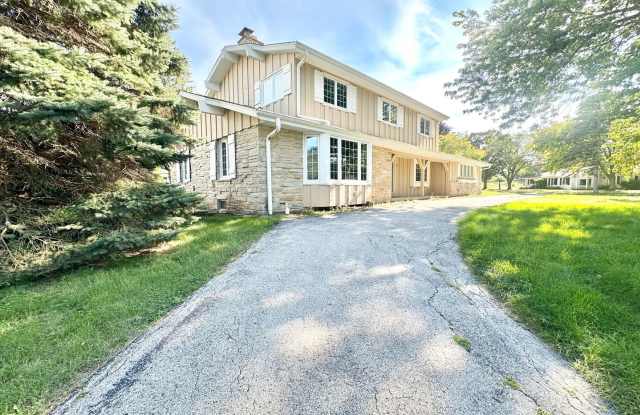 Desirable Mequon Home in Heart of Ville du Parc!