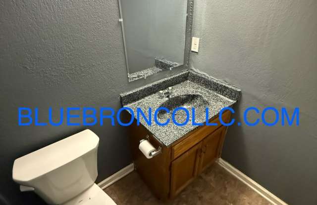 Spacious unit with granite counter tops and stainless steel appliances