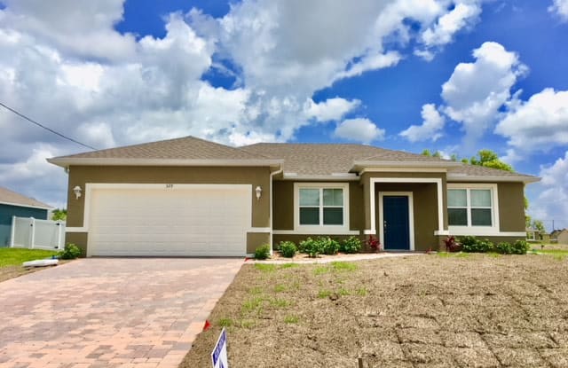 329 NW 14th Ter - 329 Northwest 14th Terrace, Cape Coral, FL 33993