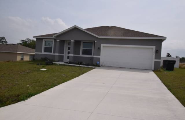 Beautiful 4 bedrooms/ 2.5 baths home with a 2 car garage for rent at 642 Desmoines Ct. Poinciana, FL 34759.