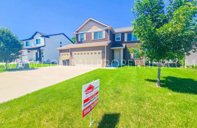 4 Bed Waukee Home with Granite Counters & Covered Deck