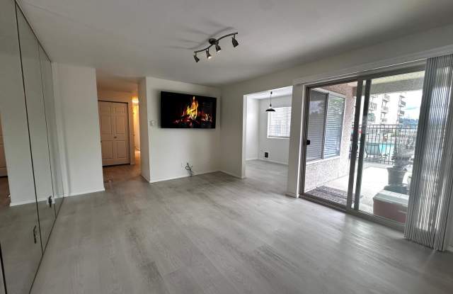Photo of Updated 2-Bedroom Condo with Water Views, 2 Parking Spaces & Poolside Location