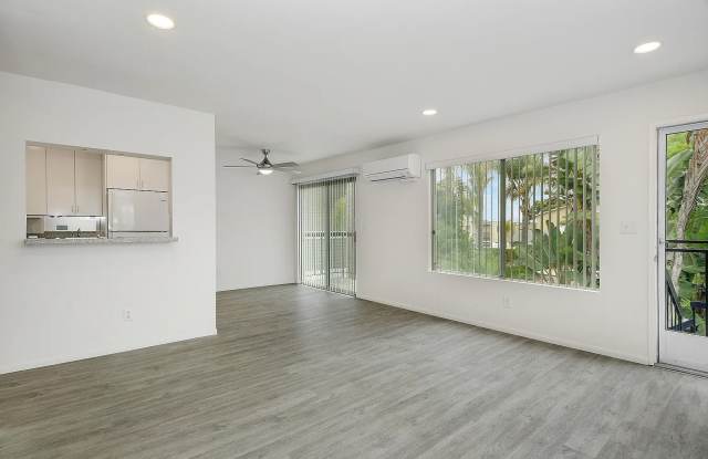 FABULOUS location! 4 blocks to the ocean  Sail Bay, AIR-CONDITIONING, IN-UNIT LAUNDRY! PRIVATE GARAGE + Addn Parking