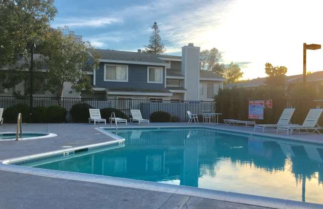 Gated Townhouse, Corner Unit, Private Patio, Community Pool, Laundry in Garage