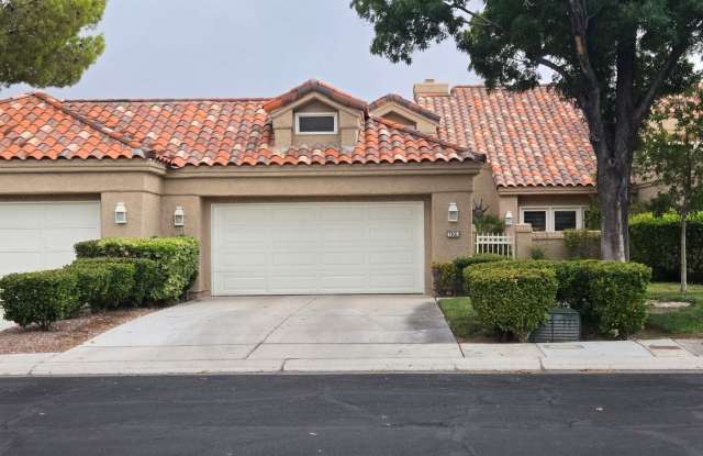 STUNNING GOLF COURSE AND WATER VIEWS IN GUARD-GATED SPANISH TRAIL!
