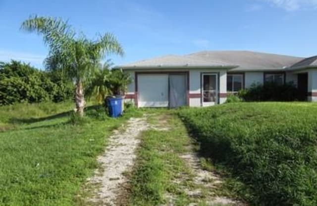 341 Grant BLVD - 341 Grant Blvd, Lehigh Acres, FL 33974