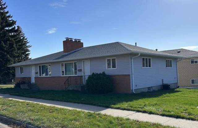 Spacious 3 bedroom 2 bathroom side by side duplex with 1 stall garage