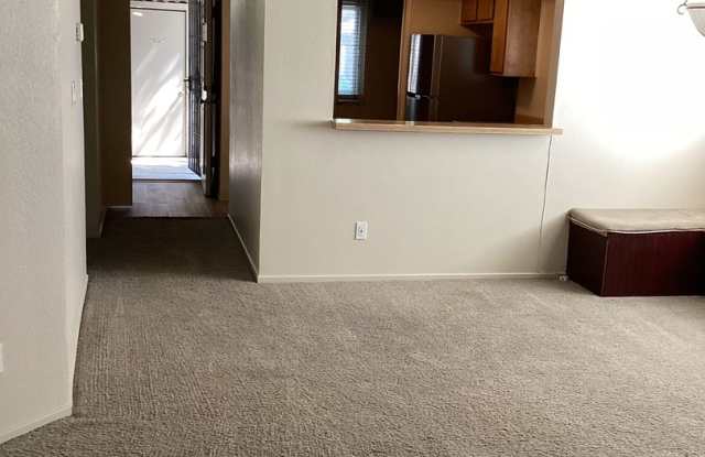 Photo of ONLY $1,350.00 PER MONTH - DON'T MISS OUT ON THIS CUTE GROUND FLOOR -2 BEDROOM/1BATH CONDO IN GATED COMMMUNITY IN SPARKS - CENTRAL AIR - FRESHLY PAINTED THROUGHOUT