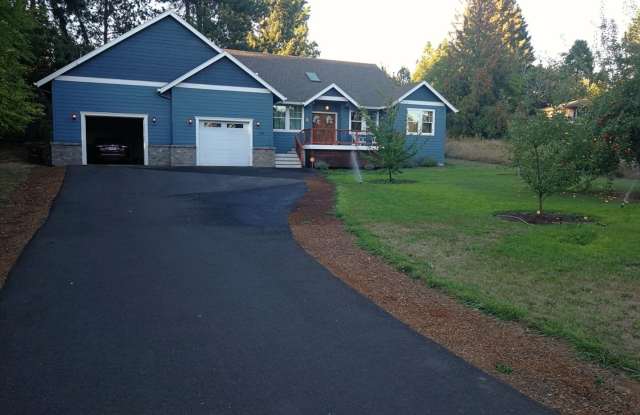 Custom Hillsboro Ranch with Gourmet Kitchen, Dual Fireplaces & Upgraded Finishes!
