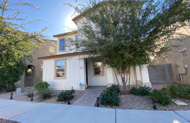 3-Bed Home with Community Pool Access, Low-Maintenance Yard, and Upgraded Kitchen, Featuring Granite Counters, Stainless Appliances, and Spacious Primary Bedroom with Ensuite.