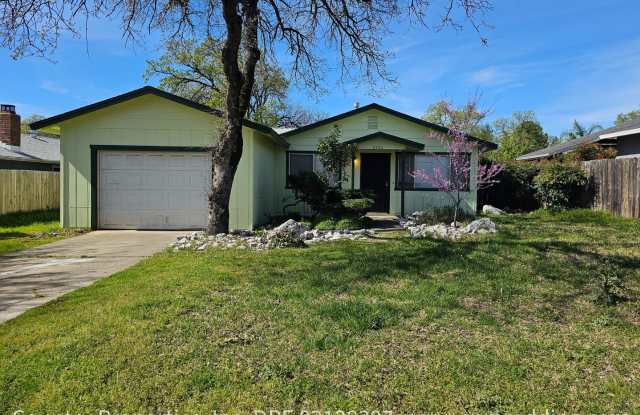Updated 3-Bedroom House with Large Yard Coming Available April 1!