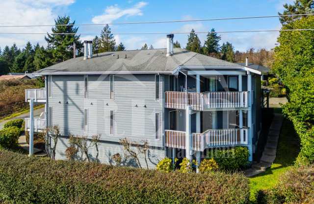 Water view 4 plex close to Silverdale and Public Transportation.