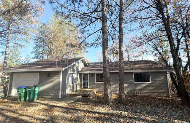 Photo of Cozy 3-Bedroom 2-Bath Retreat Nestled in the Trees!