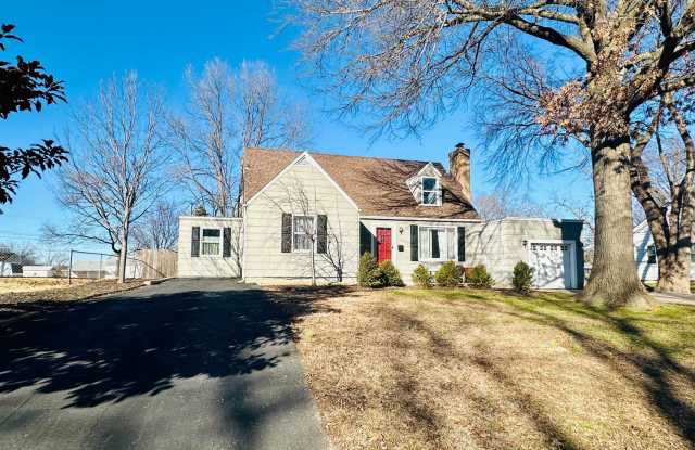 {8520} Charming Four Bedroom in Fantastic Location + Two Main Floor Bedrooms + Hardwood Floors + Fenced Yard + Unfinished basement