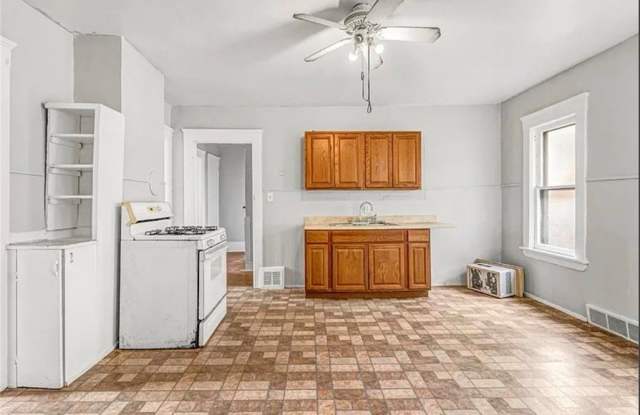 3635 E 49th Street unit: Down