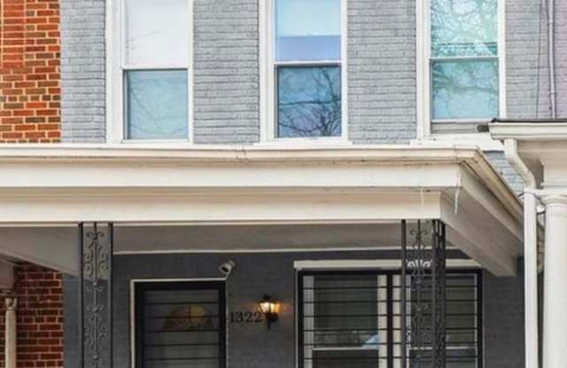 Photo of Stylishly Renovated 3 bedroom, 3.5 bath with porch and fenced in back yard!