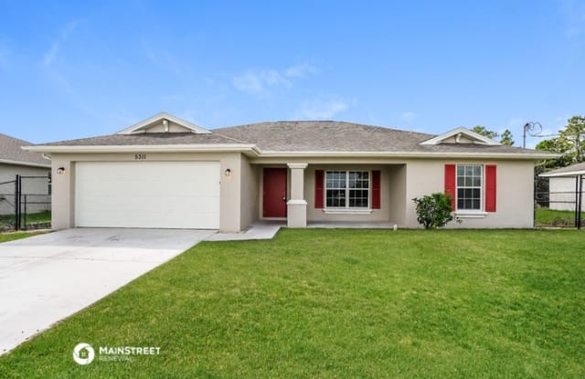 5311 Butte Street - 5311 Butte Street, Lehigh Acres, FL 33971