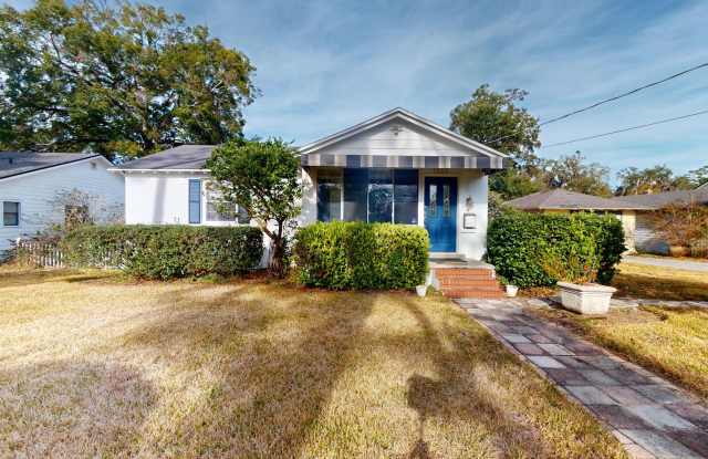 Welcome to this charming all-brick bungalow nestled in the historic neighborhood of Miramar.