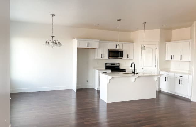 Beautiful 2-Story Premier Townhome w/Attached 2-Car Garage and Unfinished Basement in Herriman