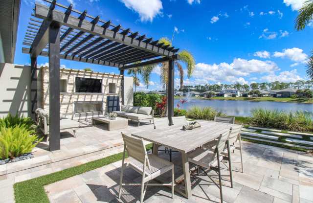 Photo of ** BRAND NEW CONSTRUCTION ULTRA-MODERN HOME ** MODEL HOME 2/2 PLUS DEN WITH OUTDOOR KITCHEN FOR ENTERTAINING ON LAKE *