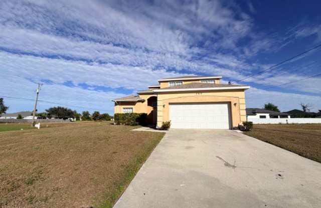 Spacious 4 bedroom, 2.5 bath, 2 car garage home for rent on a corner lot!