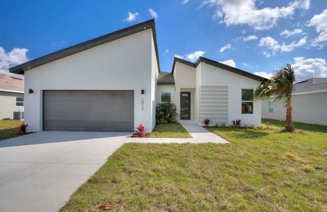 Newly Built Home! Modern, energy efficient home with ALL of the upgrades! - 1012 James Drive, Poinciana, FL 34759