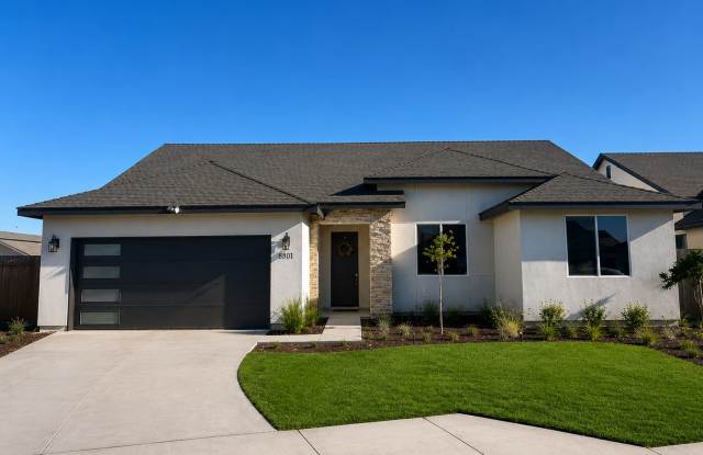 Newley Built 3-Bedroom Home with Attached 2-Car Garage, Solar Panels, Split-Wing Layout & Quartz Countertops