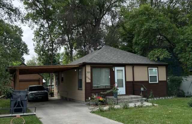 2 bedrooms, 1 bath on large lot with garage