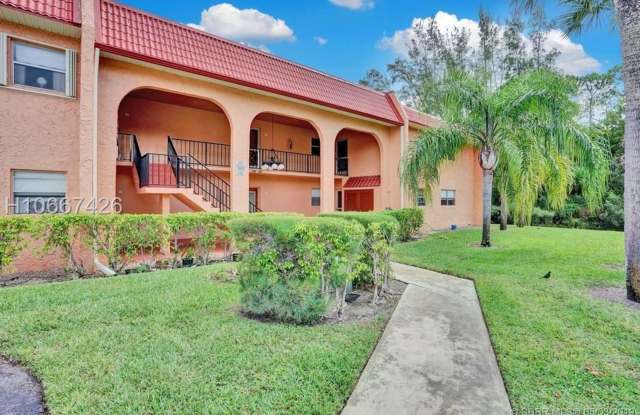 Photo of Desirable 55 plus community condo unit with a view of the lake on the 2nd Floor.