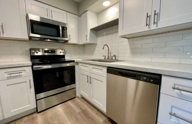 RENOVATED APARTMENT WITH IN-UNIT WASHER-DRYER  GARAGE PARKING!