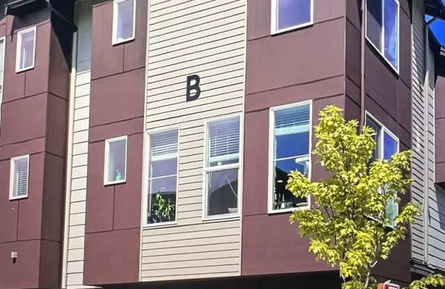 Photo of Exceptional 4 Bed 3 Bath Townhome on corner lot. One months rent free!!