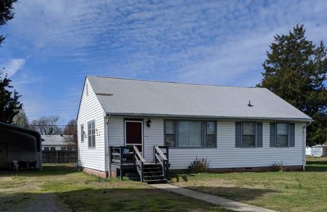 Three bedroom / one bath  with Garage and Carport