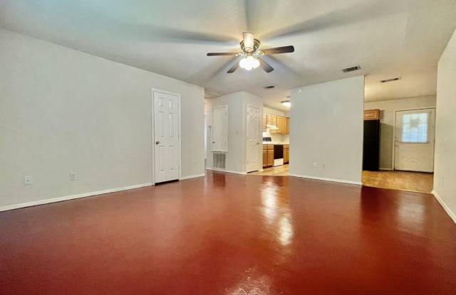 Eclectic 3 Bedroom, 2 Bathroom Home - 2 Car Garage - Fenced Yard and More!
