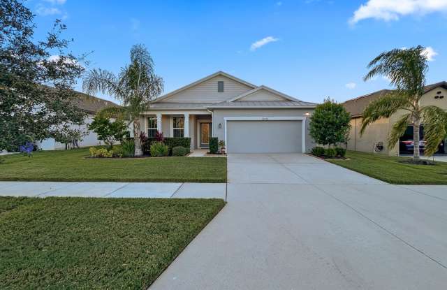 Photo of Riverview Gem – 4BR/2BA Home with Screened-In Hot Tub  Solar!!