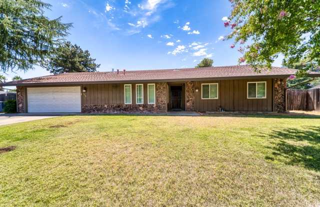 Spacious 4-Bedroom Home with Fenced Yard and 2-Car Garage