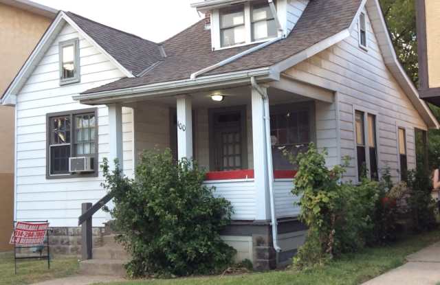 Photo of 3 bedroom 1 bath single family home with yard.