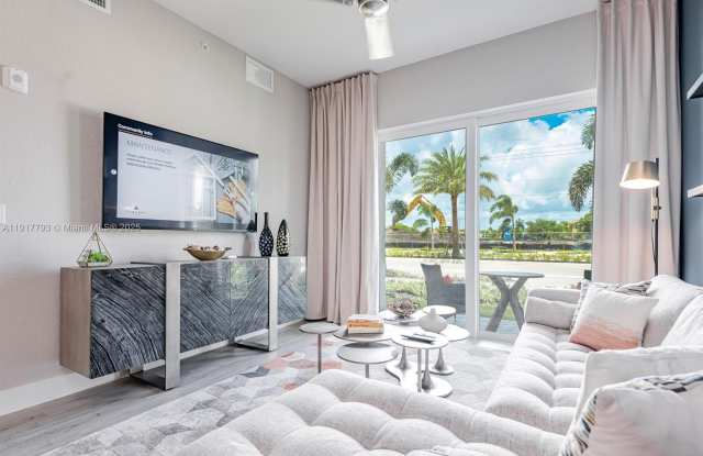 9351 W COMMERCIAL BLVD