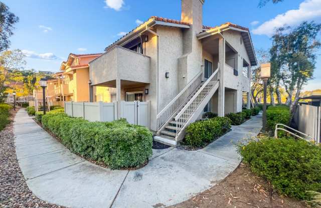 Rancho San Diego- Beautiful Mirasol Complex- 2 bed / 2 bath Upstairs Condo w A/C, Laundry + Parking- Summer Special! $750 OFF YOUR FIRST MONTH -