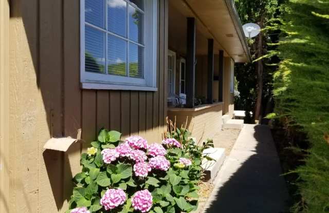 Occupied, do not disturb tenants. 2br duplex with carport and stackable washer/dryer included!
