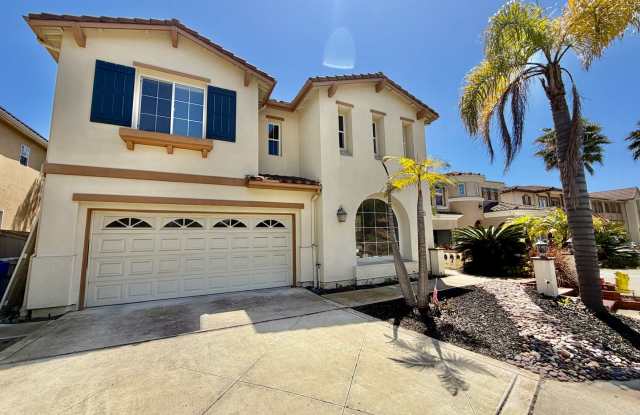 Elegant 5 Bedroom Home With Sweeping Staircase and Tons of Space!