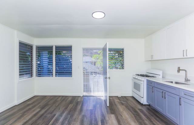 Renovated, upstairs, 2 bedroom 1 bath with luxury vinyl plank flooring throughout