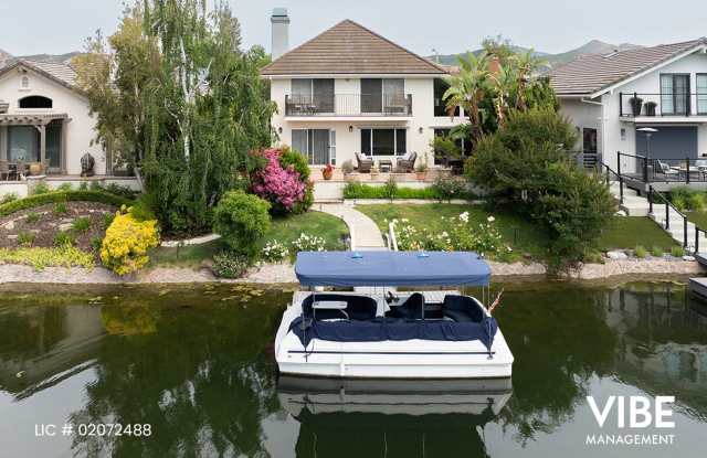 Photo of COMING SOON-Gorgeous GUARD GATED Westlake Island 3+3 home w/ BOAT DOCK  BOAT!