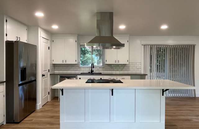 Photo of NO RENT UNTIL 2026! Updated home with Large shop!